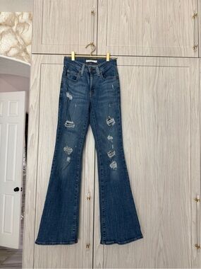 Levi's Dark Blue Distressed Flare Jeans for Women